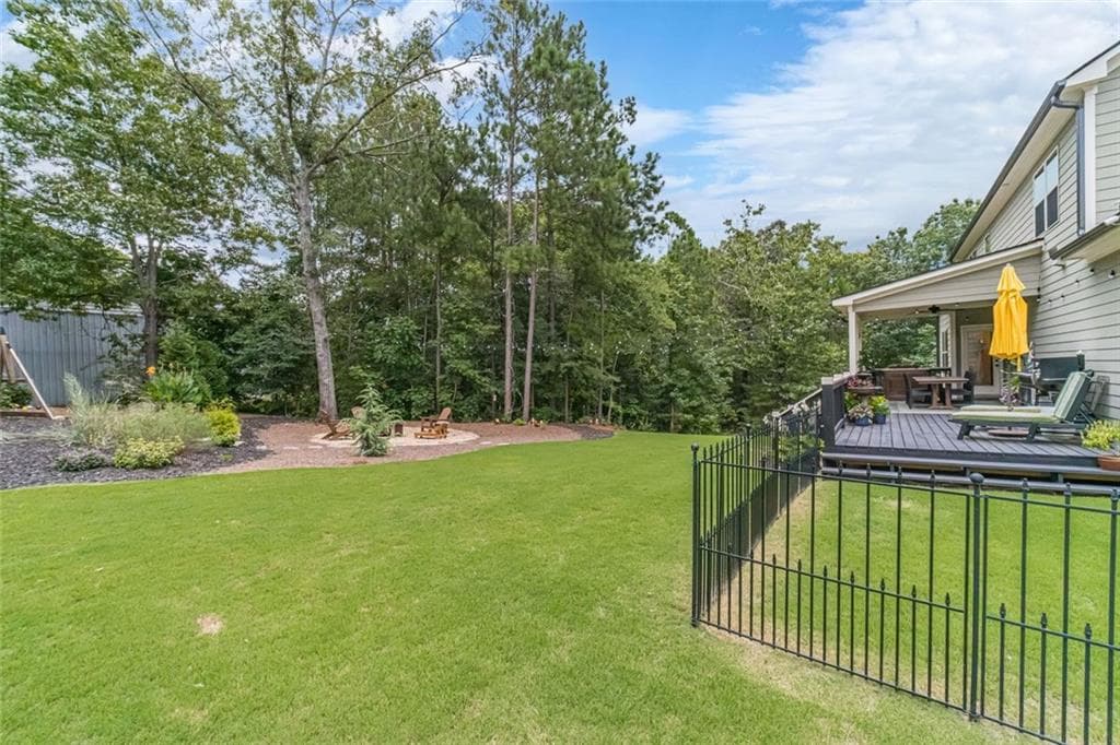 4 bedroom, 3 bathroom, 3,111 sq ft single family residence for sale at 1448 Henderson Ridge Lane, Loganville, GA 30052 — photo 4