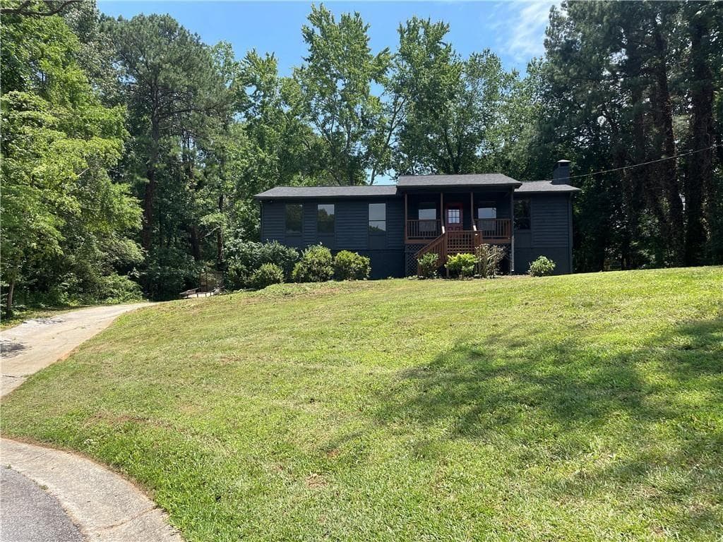 3 bedroom, 2 bathroom, 2,940 sq ft single family residence for sale at 106 Spring Way, Woodstock, GA 30189 — photo 2