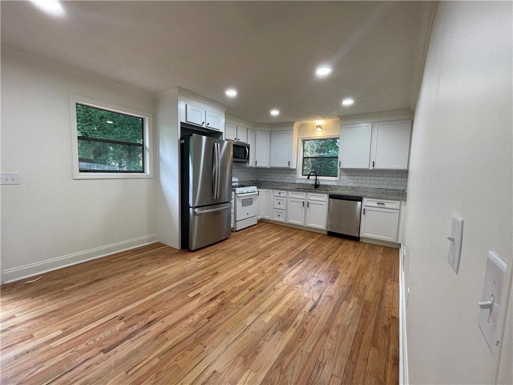 3 bedroom, 2 bathroom, 2,940 sq ft single family residence for sale at 106 Spring Way, Woodstock, GA 30189 — photo 6
