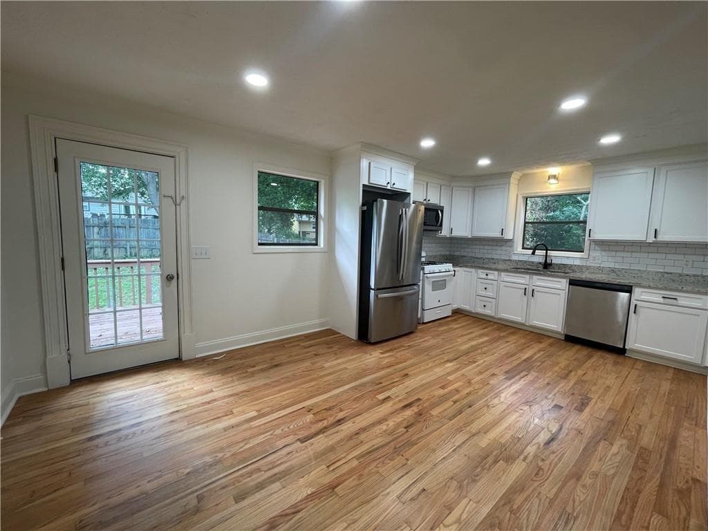 3 bedroom, 2 bathroom, 2,940 sq ft single family residence for sale at 106 Spring Way, Woodstock, GA 30189 — photo 7