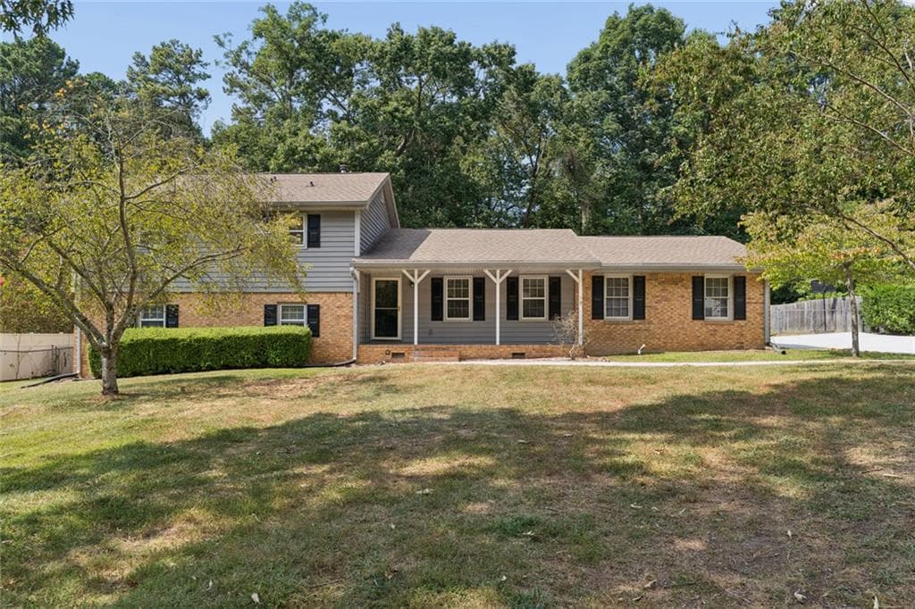 4 bedroom, 3 bathroom, 2,271 sq ft single family residence for sale at 2119 Eastwood Drive, Snellville, GA 30078 — photo 1 of 56