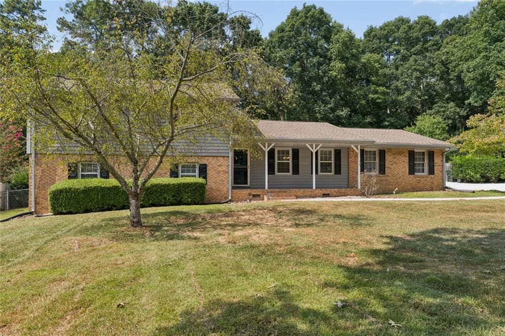 4 bedroom, 3 bathroom, 2,271 sq ft single family residence for sale at 2119 Eastwood Drive, Snellville, GA 30078 — photo 2