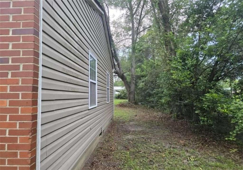 4 bedroom, 2 bathroom, 1,125 sq ft single family residence under contract at 64 Henry Street, Camilla, GA 31730 — photo 3