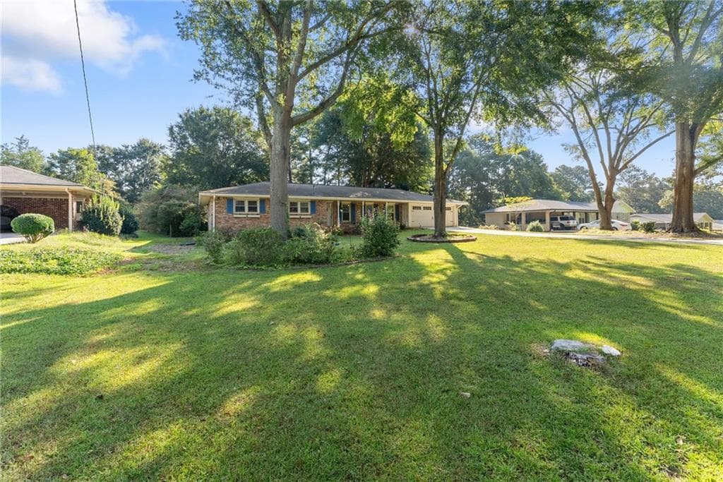 3 bedroom, 2 bathroom, 1,671 sq ft single family residence under contract at 1212 Stephens Street, Lilburn, GA 30047 — photo 4