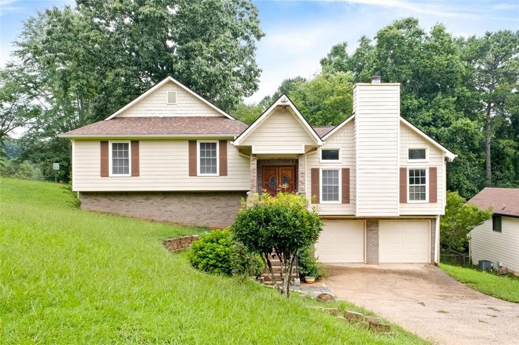 4 bedroom, 3 bathroom, 2,384 sq ft single family residence for sale at 3573 Downing Street, Marietta, GA 30066 — photo 2