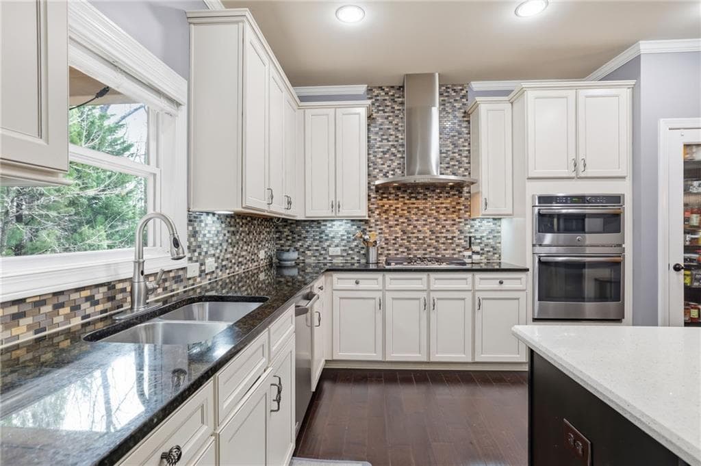 8 bedroom, 5 bathroom, 6,236 sq ft single family residence for sale at 2740 Augeron Court, Alpharetta, GA 30004 — photo 7