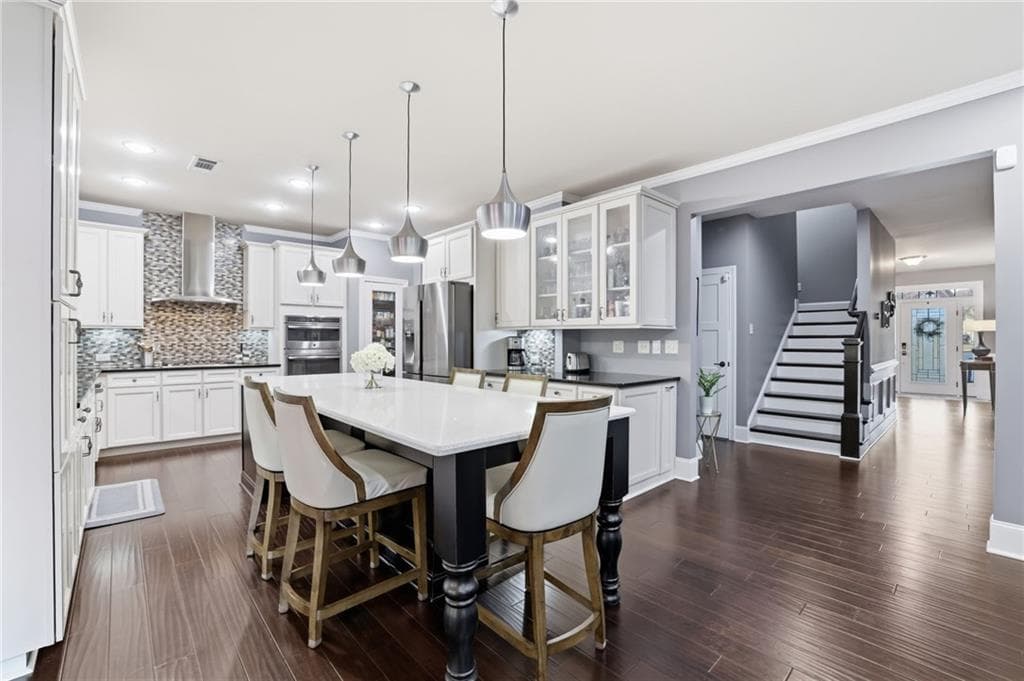 8 bedroom, 5 bathroom, 6,236 sq ft single family residence for sale at 2740 Augeron Court, Alpharetta, GA 30004 — photo 6