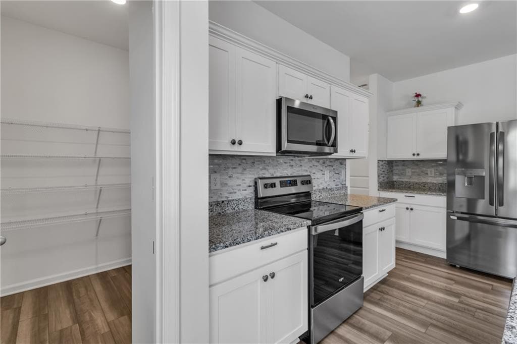4 bedroom, 3 bathroom, 2,132 sq ft single family residence for sale at 110 Bantry Way, Locust Grove, GA 30248 — photo 8