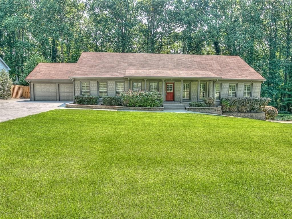 6 bedroom, 4 bathroom, 2,466 sq ft single family residence for rent at 5575 Lake Forrest Drive, Atlanta, GA 30342 for $4,500 a month — photo 1 of 25