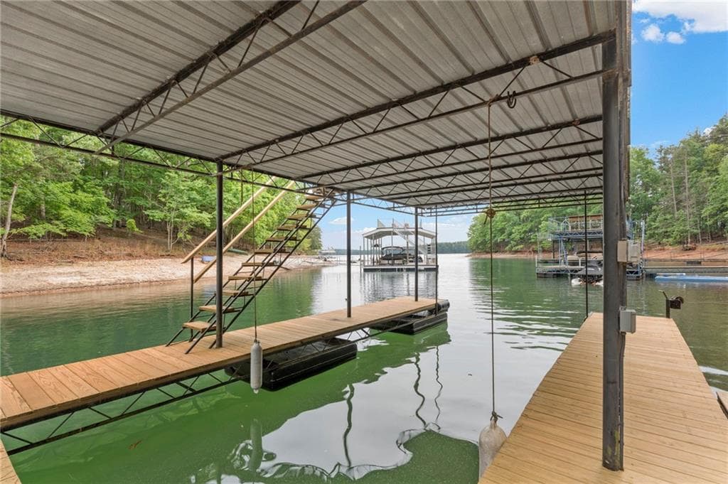 6 bedroom, 7 bathroom, 7,363 sq ft single family residence for sale at 7430 Shadburn Ferry Road, Cumming, GA 30041 — photo 6