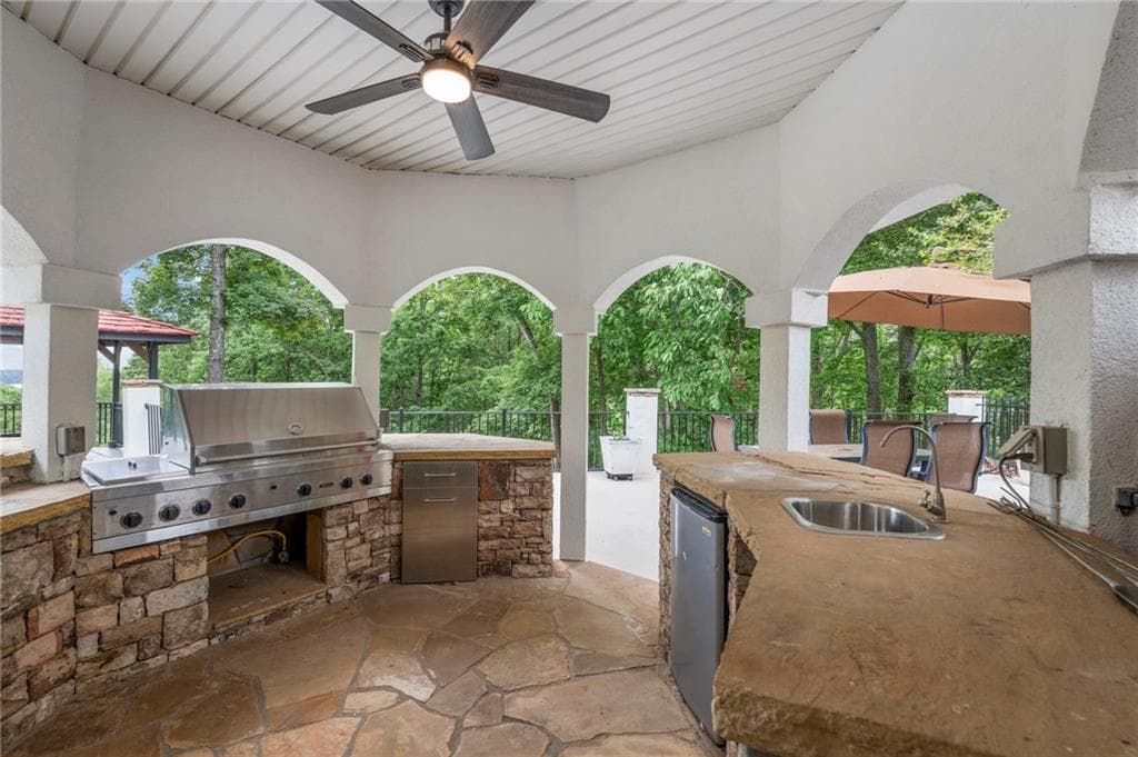 6 bedroom, 7 bathroom, 7,363 sq ft single family residence for sale at 7430 Shadburn Ferry Road, Cumming, GA 30041 — photo 10