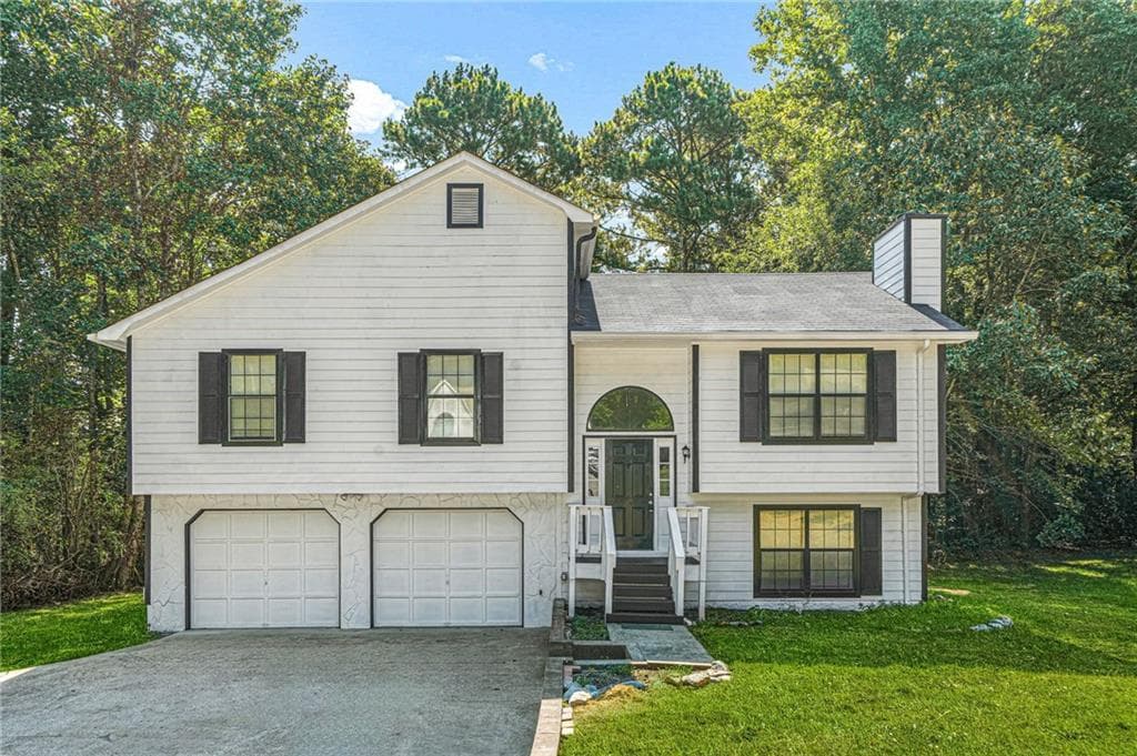 4 bedroom, 3 bathroom, 1,182 sq ft single family residence for sale at 3644 Bomar Road, Douglasville, GA 30135 — photo 1 of 57
