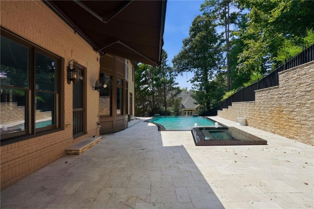 7 bedroom, 6 bathroom, 6,568 sq ft single family residence for sale at 245 Steeple Point Drive, Roswell, GA 30076 — photo 2