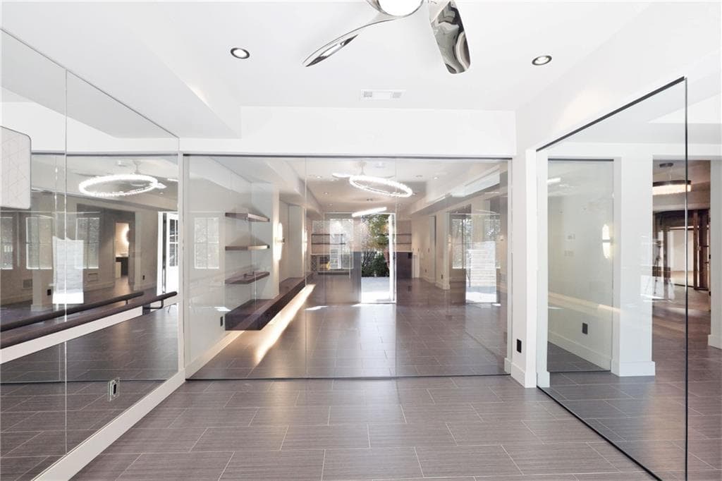 7 bedroom, 6 bathroom, 6,568 sq ft single family residence for sale at 245 Steeple Point Drive, Roswell, GA 30076 — photo 9