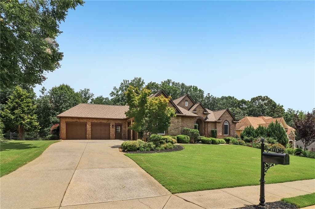 4 bedroom, 4 bathroom, 6,072 sq ft single family residence for sale at 5715 Catalpa Court, Cumming, GA 30040 — photo 3