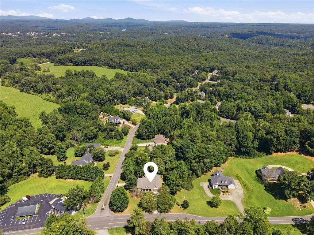 5 bedroom, 4 bathroom, 5,740 sq ft single family residence for sale at 269 Nix Bridge Road, Dawsonville, GA 30534 — photo 2