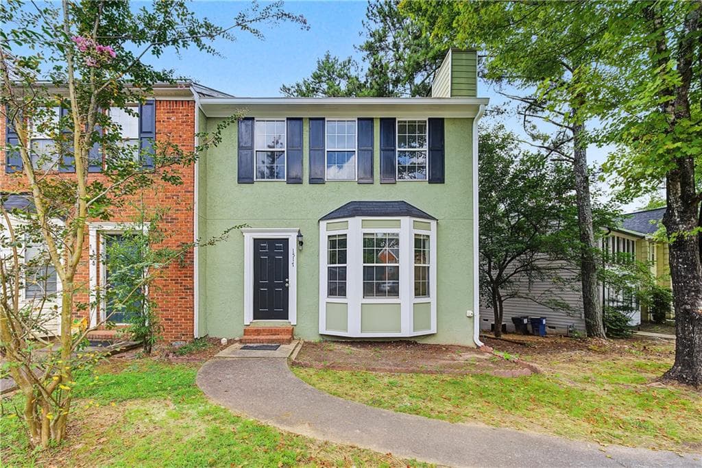 2 bedroom, 3 bathroom, 1,246 sq ft townhouse for sale at 1517 Cedar Bluff Trail, Marietta, GA 30062 — photo 1 of 21