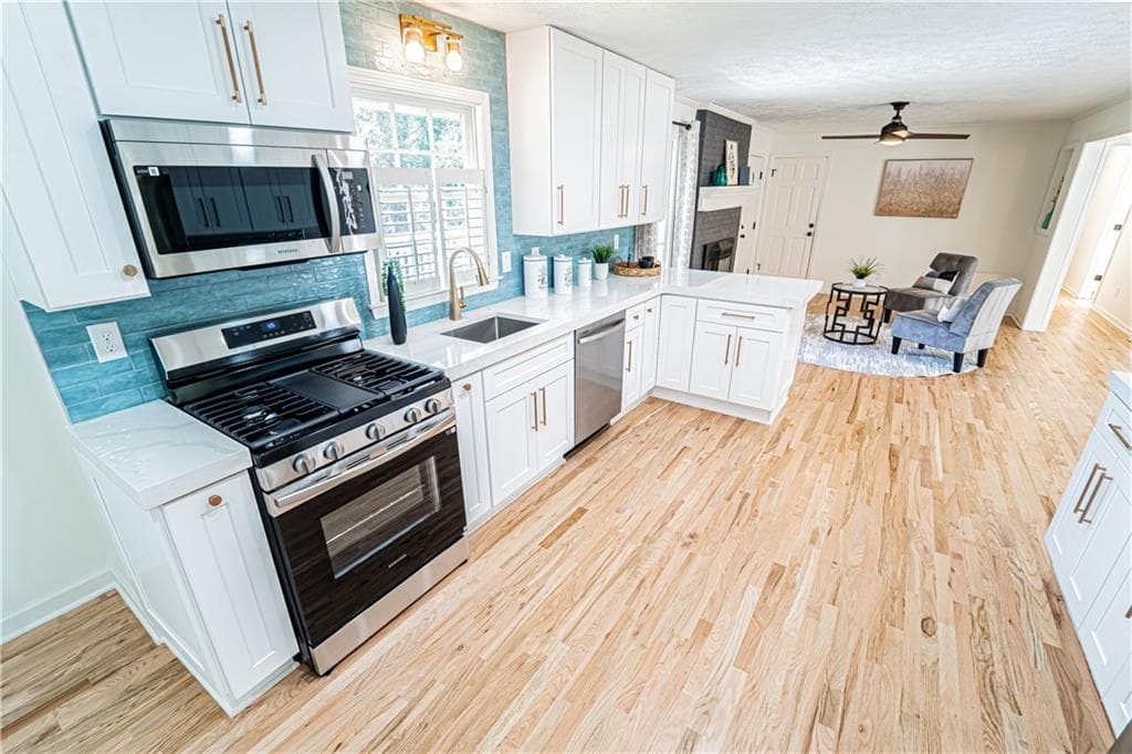 5 bedroom, 5 bathroom, 3,400 sq ft single family residence for sale at 5205 CORINTH Circle, Stone Mountain, GA 30087 — photo 5