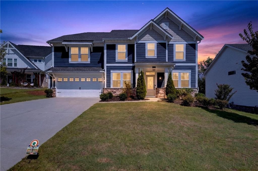 5 bedroom, 3 bathroom, 3,182 sq ft single family residence for sale at 8150 Brewton Bend, Ball Ground, GA 30107 — photo 2