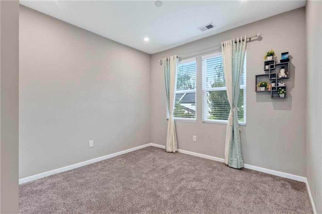 5 bedroom, 3 bathroom, 3,182 sq ft single family residence for sale at 8150 Brewton Bend, Ball Ground, GA 30107 — photo 8