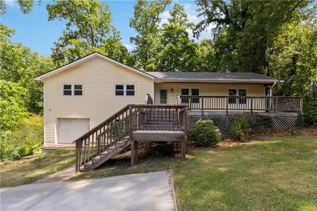 4 bedroom, 2 bathroom, 1,388 sq ft single family residence for sale at 606 Echo Lane, Woodstock, GA 30189 — photo 2