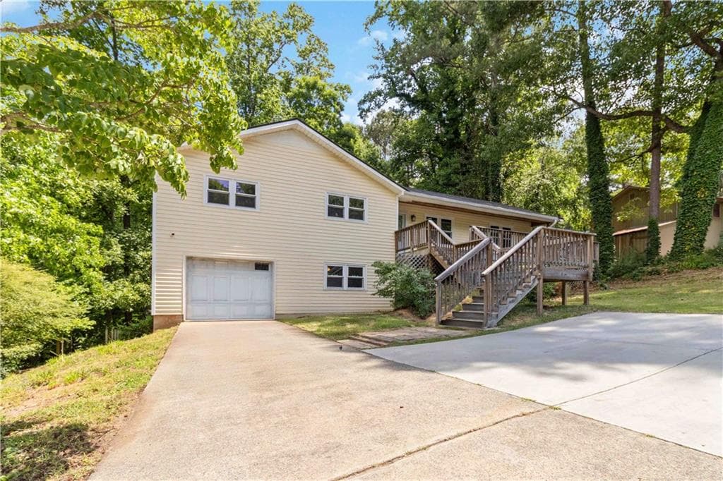 4 bedroom, 2 bathroom, 1,388 sq ft single family residence for sale at 606 Echo Lane, Woodstock, GA 30189 — photo 3