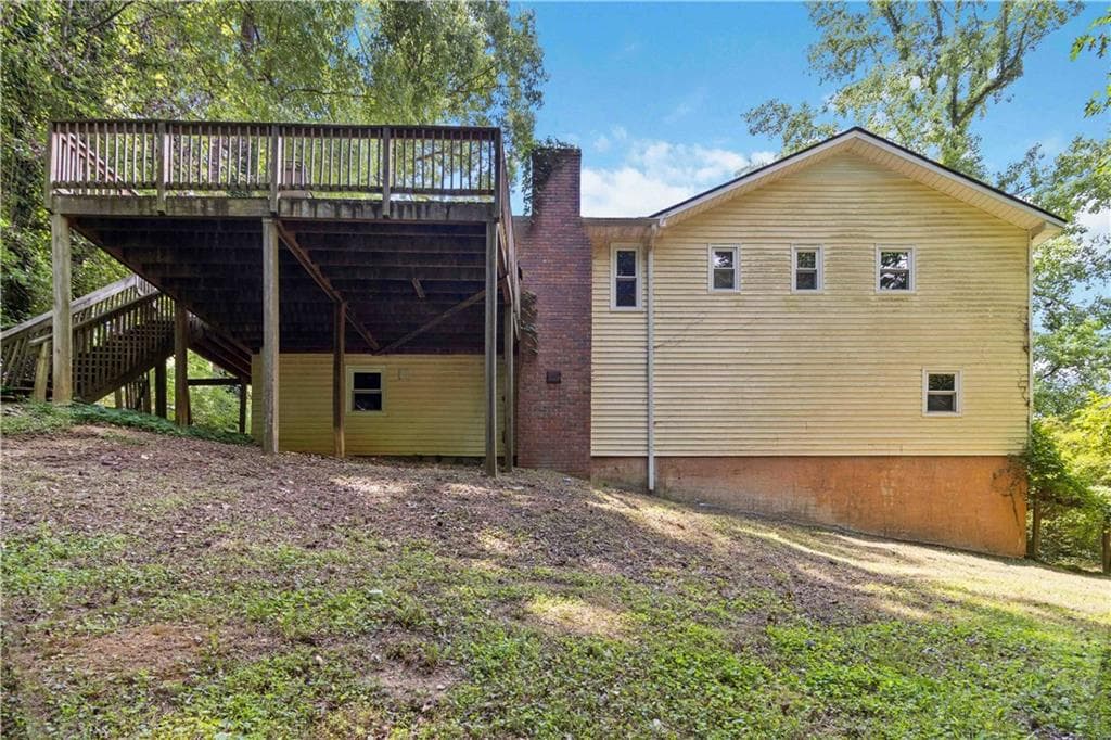 4 bedroom, 2 bathroom, 1,388 sq ft single family residence for sale at 606 Echo Lane, Woodstock, GA 30189 — photo 5