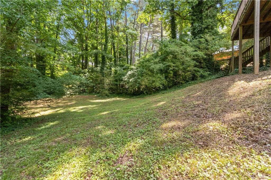 4 bedroom, 2 bathroom, 1,388 sq ft single family residence for sale at 606 Echo Lane, Woodstock, GA 30189 — photo 6