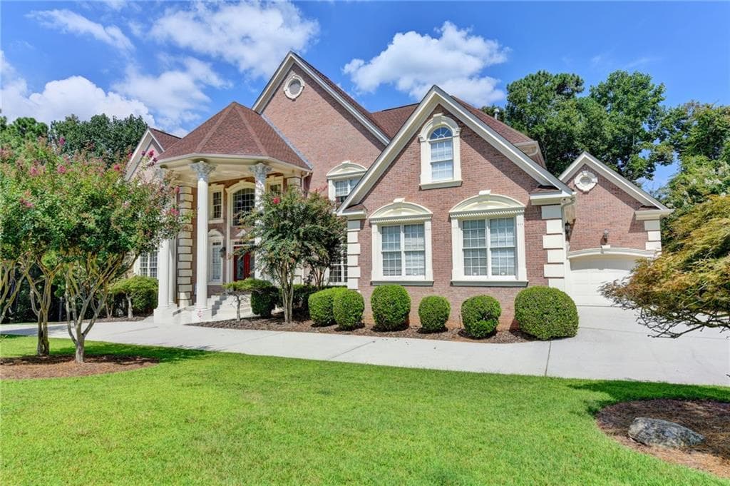 4 bedroom, 5 bathroom, 5,122 sq ft single family residence for sale at 8280 Sentinae Chase Drive, Roswell, GA 30076 — photo 4