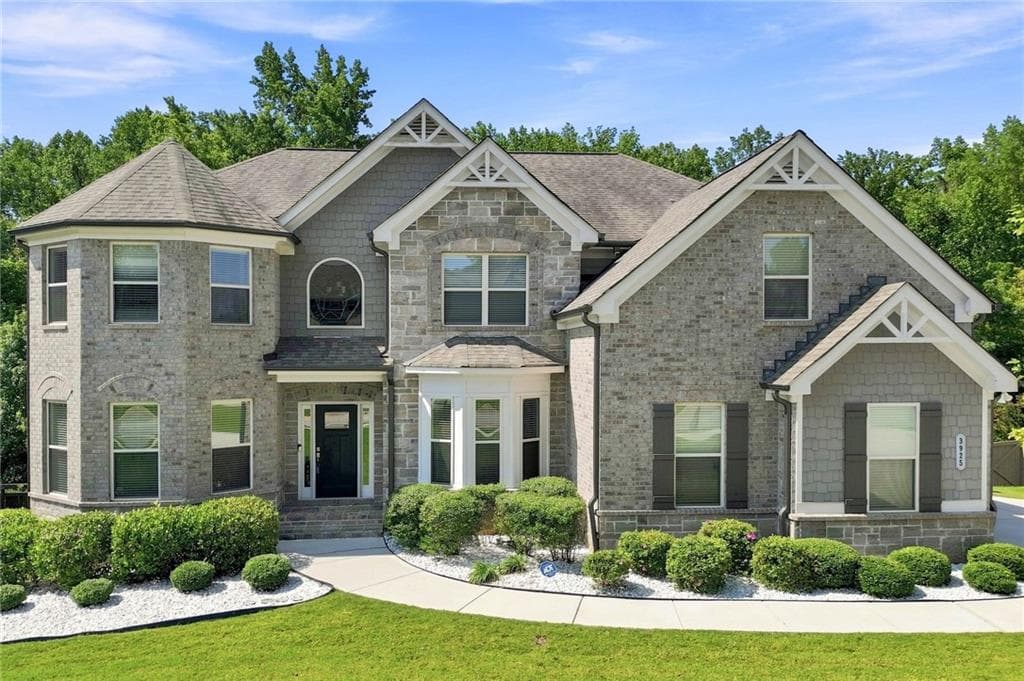 5 bedroom, 4 bathroom, 4,091 sq ft single family residence for sale at 3925 Amberhill Circle, Cumming, GA 30040