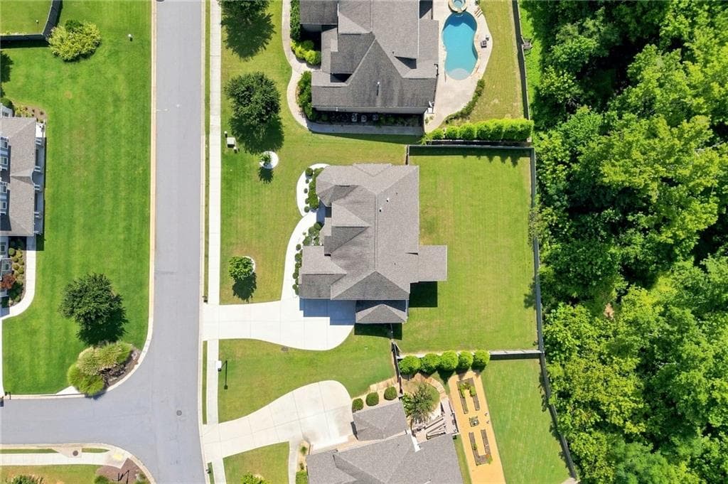 5 bedroom, 4 bathroom, 4,091 sq ft single family residence for sale at 3925 Amberhill Circle, Cumming, GA 30040 — photo 4