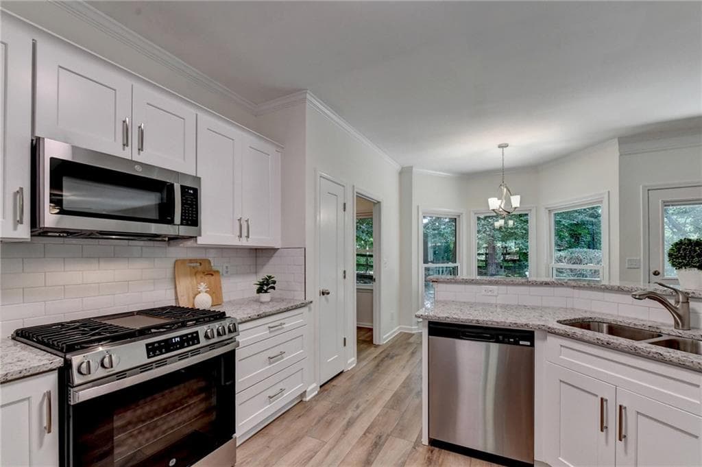 4 bedroom, 4 bathroom, 2,500 sq ft single family residence for sale at 150 Ashewoode Downs Lane, Johns Creek, GA 30005 — photo 3
