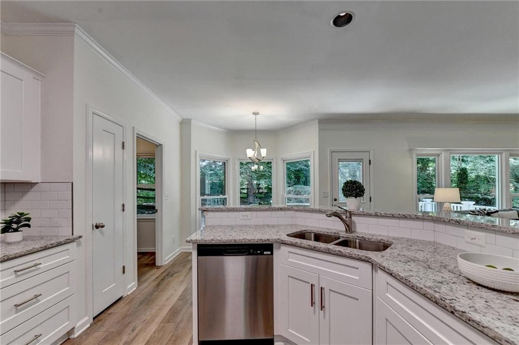 4 bedroom, 4 bathroom, 2,500 sq ft single family residence for sale at 150 Ashewoode Downs Lane, Johns Creek, GA 30005 — photo 4
