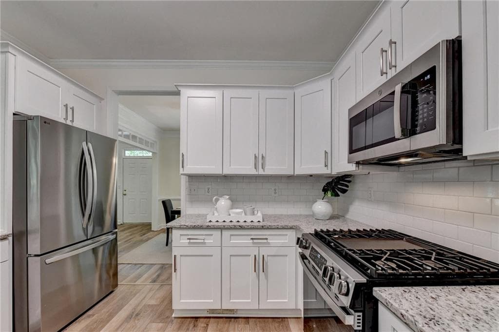 4 bedroom, 4 bathroom, 2,500 sq ft single family residence for sale at 150 Ashewoode Downs Lane, Johns Creek, GA 30005 — photo 6