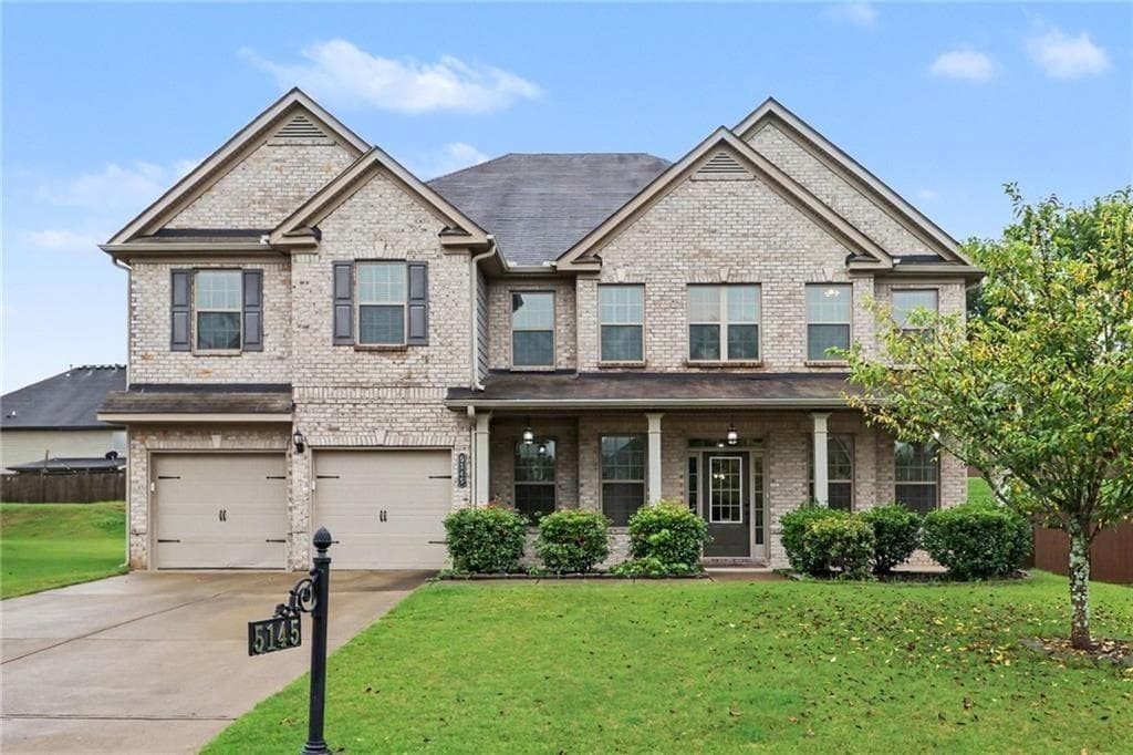 5 bedroom, 4 bathroom, 4,166 sq ft single family residence for sale at 5145 Whisper Point Boulevard, Cumming, GA 30028 — photo 1 of 29