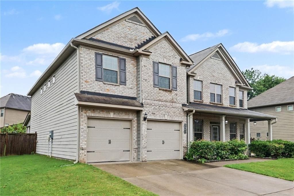 5 bedroom, 4 bathroom, 4,166 sq ft single family residence for sale at 5145 Whisper Point Boulevard, Cumming, GA 30028 — photo 4