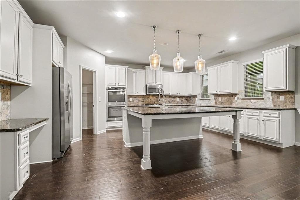 5 bedroom, 4 bathroom, 4,166 sq ft single family residence for sale at 5145 Whisper Point Boulevard, Cumming, GA 30028 — photo 9