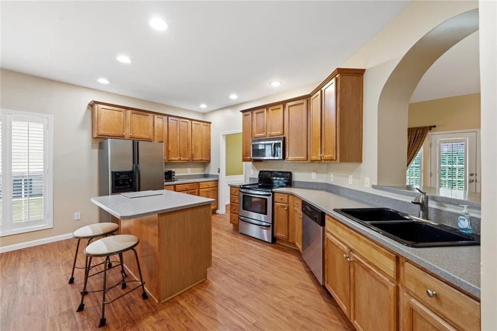 4 bedroom, 4 bathroom, 3,148 sq ft single family residence for sale at 3709 The Great Drive, Atlanta, GA 30349 — photo 6