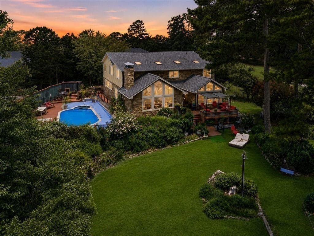 5 bedroom, 3 bathroom, 4,676 sq ft single family residence for sale at 8225 Dogwood Trail, Cumming, GA 30041 — photo 2