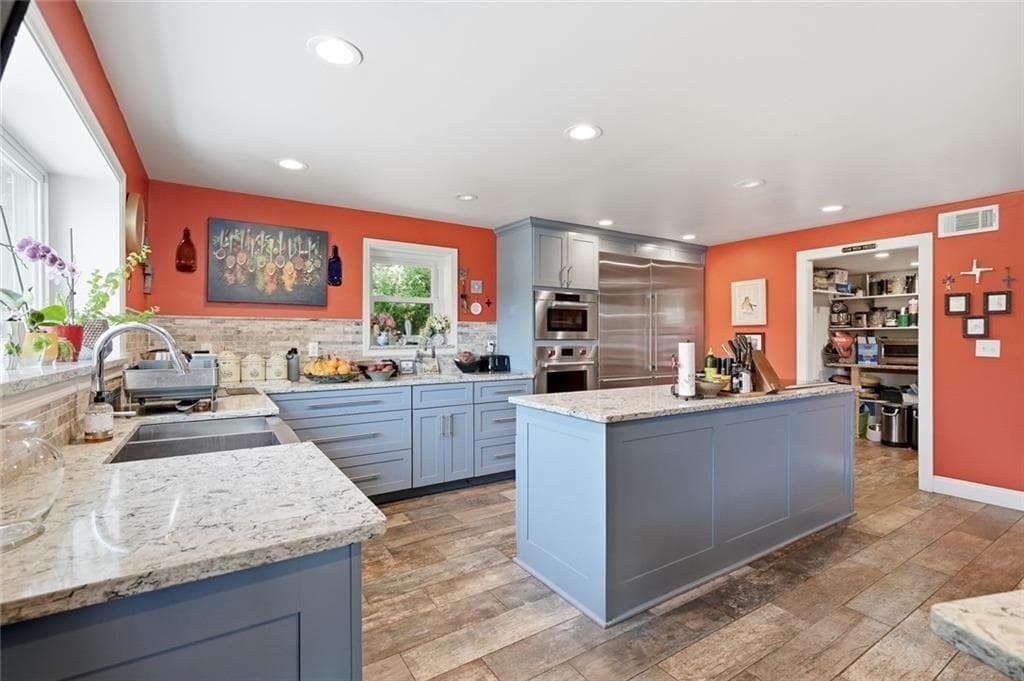 5 bedroom, 3 bathroom, 4,676 sq ft single family residence for sale at 8225 Dogwood Trail, Cumming, GA 30041 — photo 7