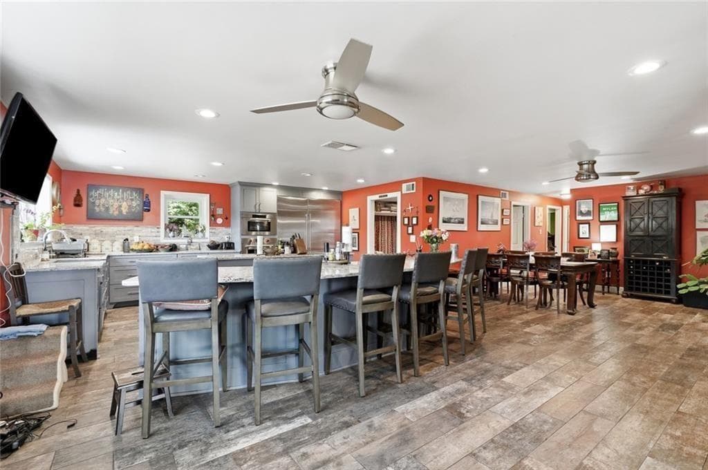 5 bedroom, 3 bathroom, 4,676 sq ft single family residence for sale at 8225 Dogwood Trail, Cumming, GA 30041 — photo 8