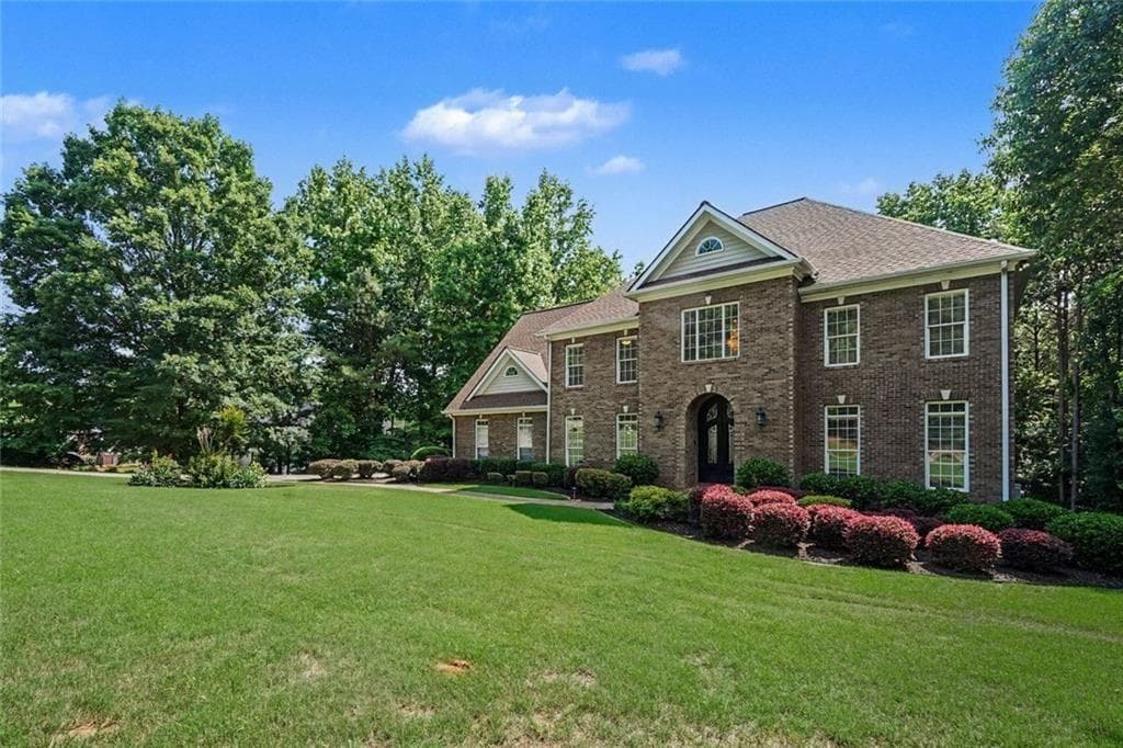 6 bedroom, 5 bathroom, 6,441 sq ft single family residence for sale at 952 Ardmore Trail, Hoschton, GA 30548 — photo 2