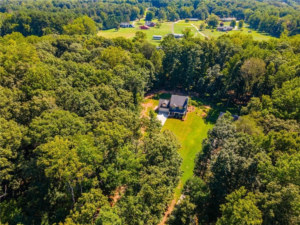 4 bedroom, 3 bathroom, 1,867 sq ft single family residence for sale at 8816 Shallow Creek Trail, Clermont, GA 30527 — photo 2