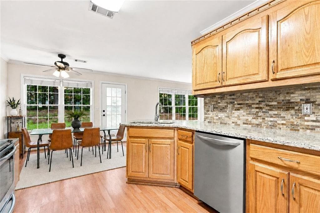 4 bedroom, 3 bathroom, 2,344 sq ft single family residence for sale at 2232 Woodbriar Drive, Buford, GA 30518 — photo 4