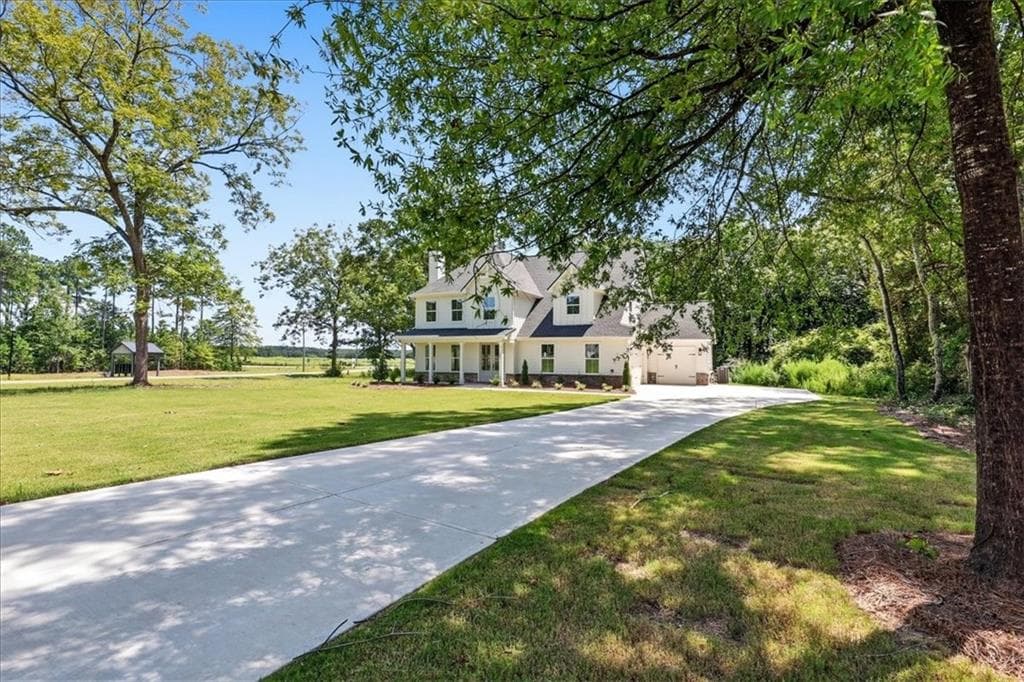 4 bedroom, 4 bathroom, 2,536 sq ft single family residence for sale at 327 Springtime Way, Monroe, GA 30655 — photo 2