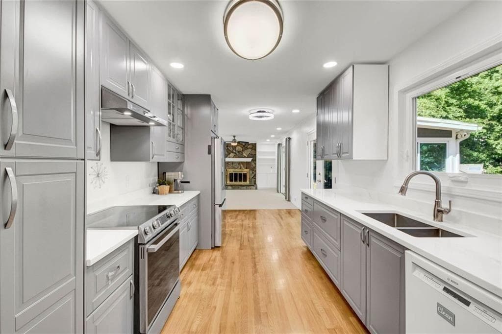 4 bedroom, 3 bathroom, 2,608 sq ft single family residence for sale at 5080 Nesbit Ferry Lane, Sandy Springs, GA 30350 — photo 1 of 47
