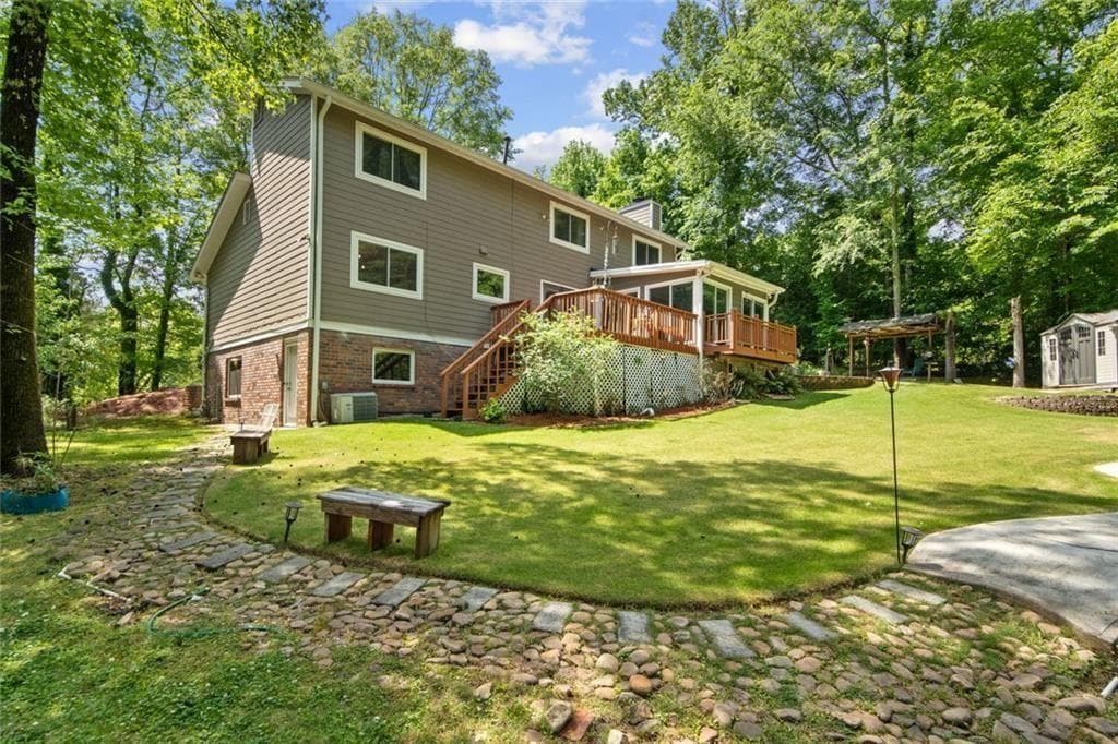 4 bedroom, 3 bathroom, 2,608 sq ft single family residence for sale at 5080 Nesbit Ferry Lane, Sandy Springs, GA 30350 — photo 3