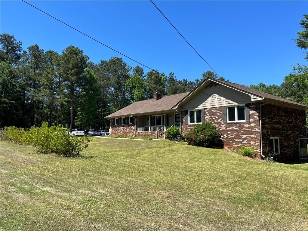 4 bedroom, 3 bathroom, 4,101 sq ft single family residence for sale at 4993 west price rd, Suwanee, GA 30024 — photo 5