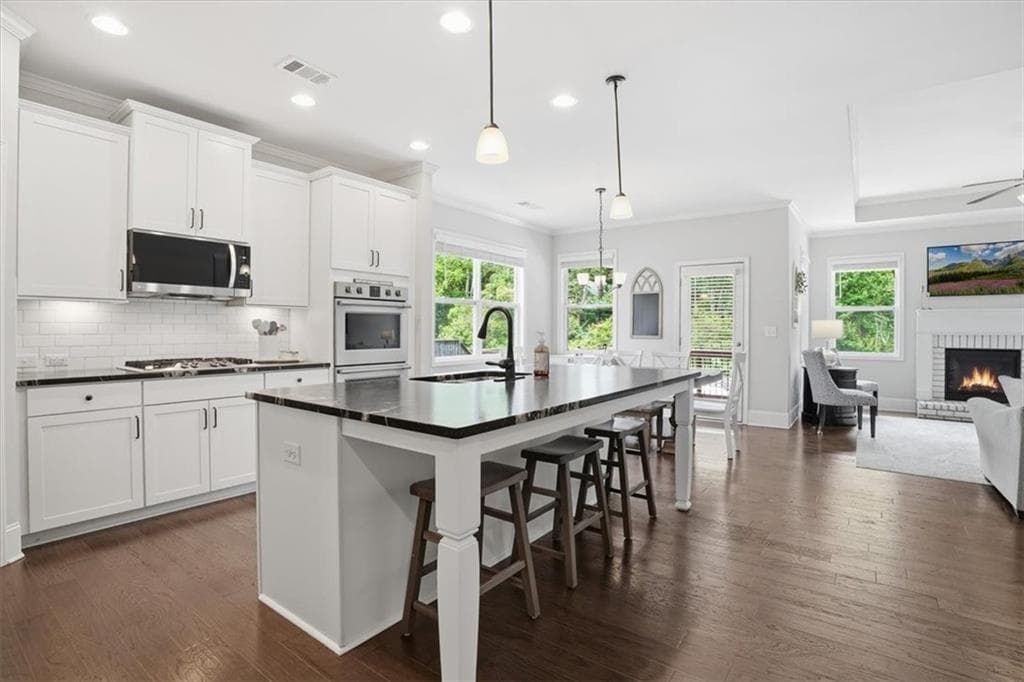 5 bedroom, 5 bathroom, 3,218 sq ft single family residence for sale at 6265 Privet Way, Cumming, GA 30028 — photo 3