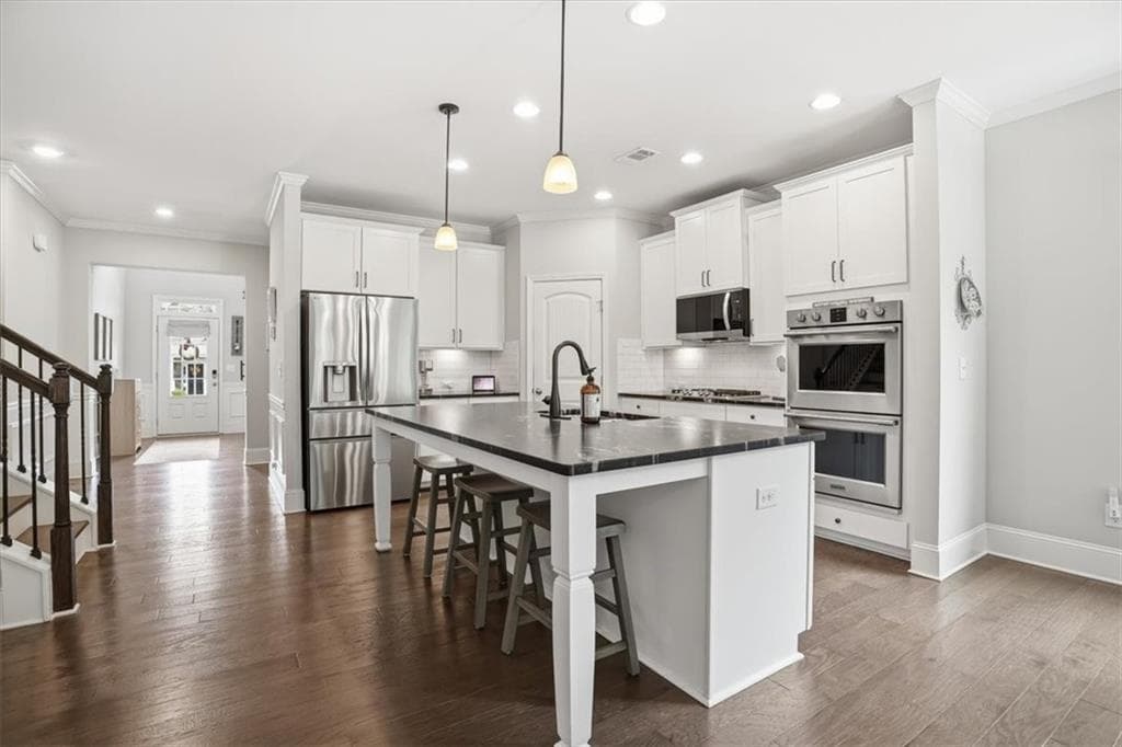 5 bedroom, 5 bathroom, 3,218 sq ft single family residence for sale at 6265 Privet Way, Cumming, GA 30028 — photo 9
